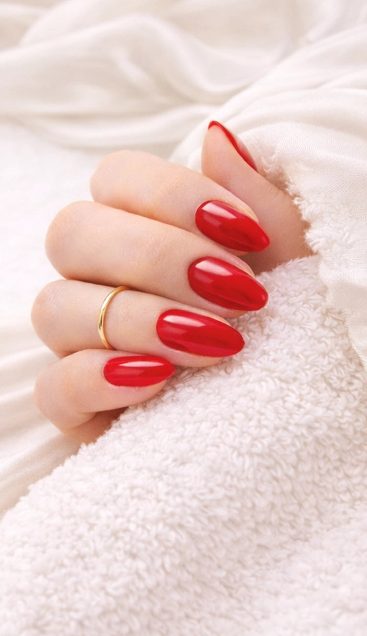 Glossy red nails done with Glamisu gel nail wraps