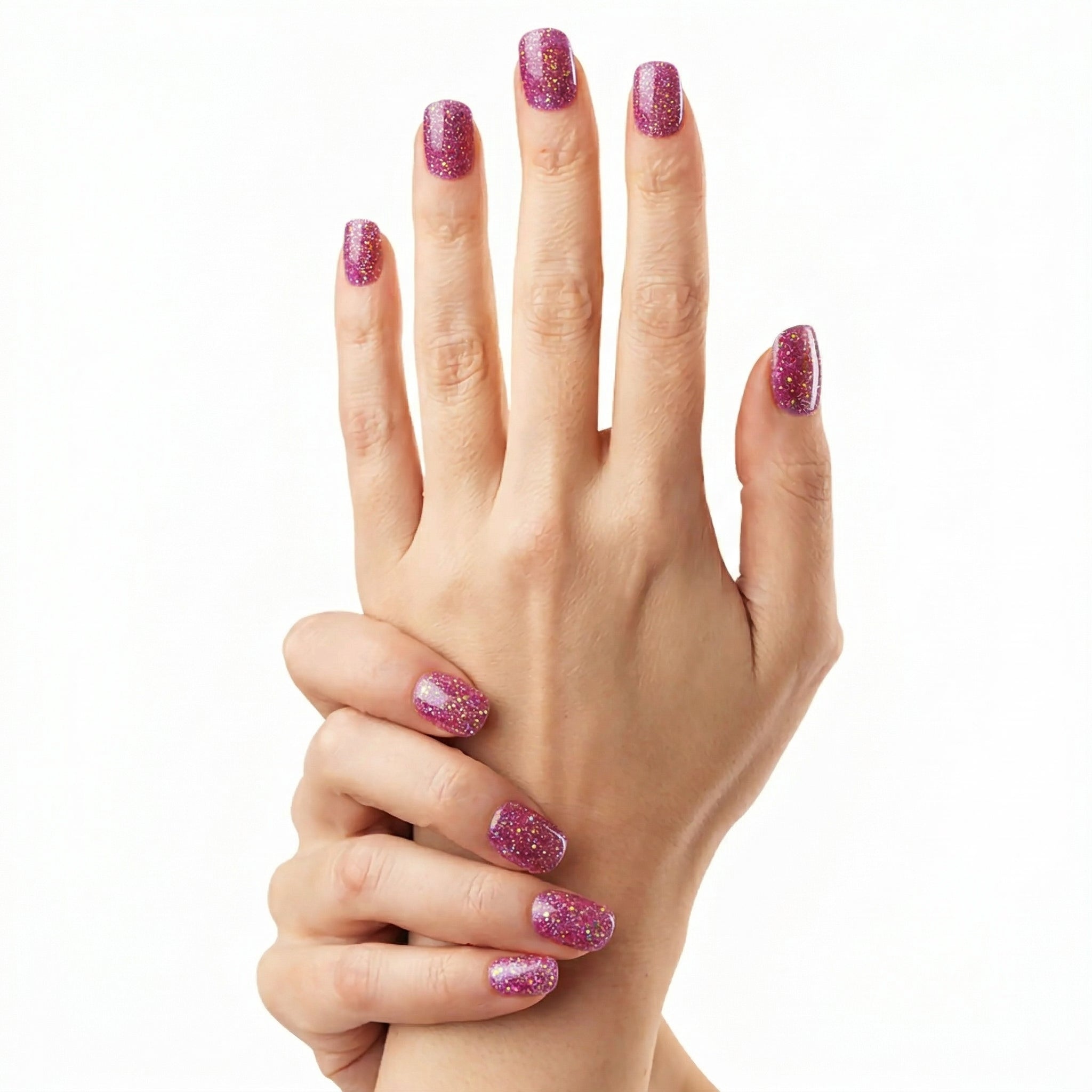 Gel wraps Glamisu rose pailleté avec effet glitter scintillant sur ongles naturels, finition brillante, main en pose élégante sur poignet, manucure sans UV